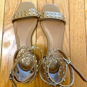 Wrap around sandals with gold studs.